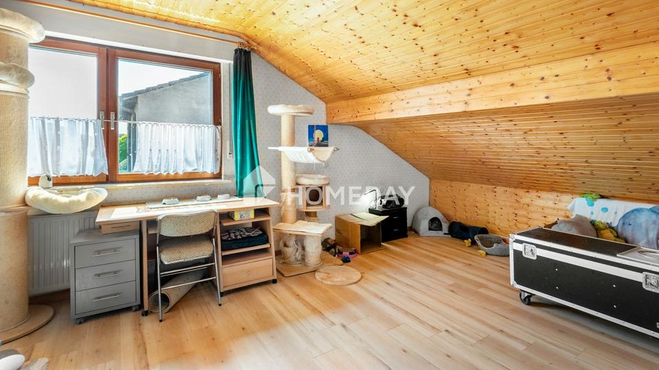 Modernisiertes Einfamilienhaus mit separater Einliegerwohnung und großem Grundstück – Bild 13