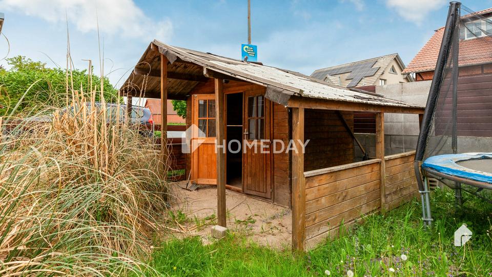 Charmantes Mehrfamilienhaus mit zwei Wohneinheiten, Garage, Carport und großzügigem Garten – Bild 13