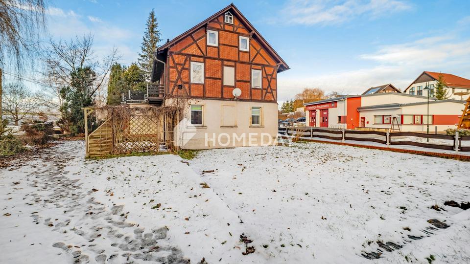 Familienfreundliches Einfamilienhaus mit 6 Zimmern, Garten, Balkon und Garagen – Bild 4