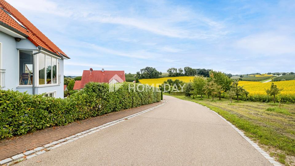 Modernes Einfamilienhaus mit Einliegerwohnung in Hanglage und tollem Ausblick – Bild 10