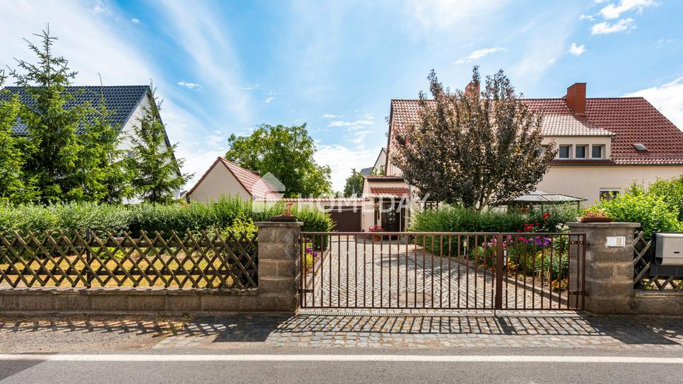 Idyllische Wohnqualität mit Garage, Garten, überdachter Südterrasse, Nebengebäude & Raumvielfalt – Bild 2