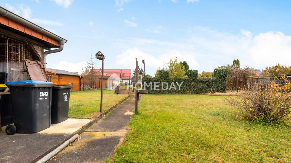 Viel Platz für Ihre Ideen: Einfamilienhaus mit 4 Zimmern, großem Garten und Nebengebäude – Bild 4