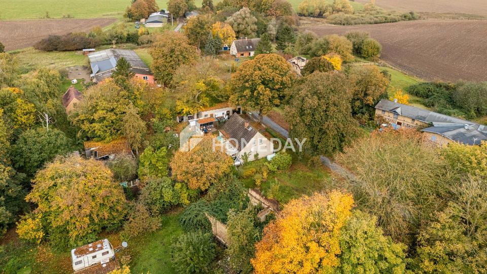 Charmantes EFH mit großem Grundstück, Nebengebäuden und idyllischer Lage in Warnow OT Schlockow – Bild 2
