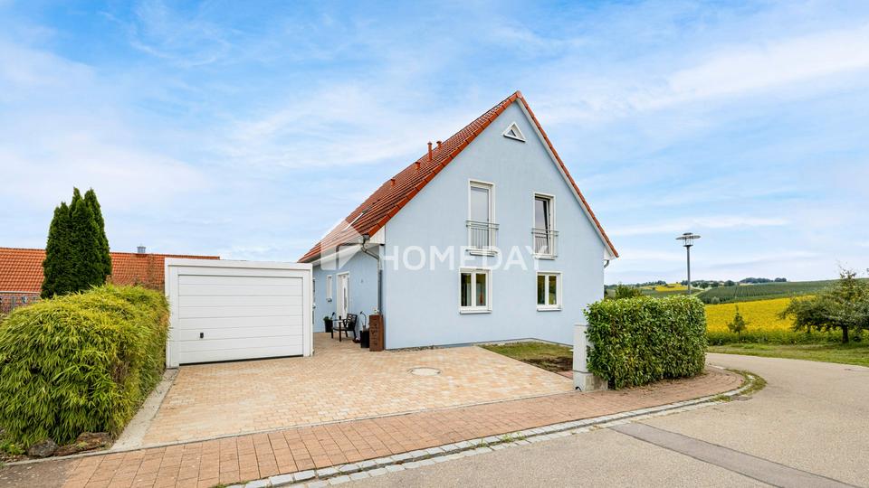Modernes Einfamilienhaus mit Einliegerwohnung in Hanglage und tollem Ausblick – Bild 2