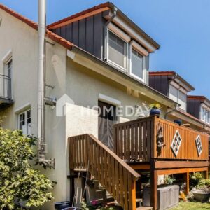 Einladendes Reihenendhaus: Ihr gemütliches Zuhause mit Kamin, Südwest-Balkon und Gartenidylle