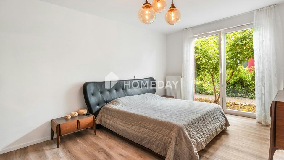 Rückzugsort mit Freiraum: 5-Zimmer-Wohnung mit Garten und Garage – Bild 9