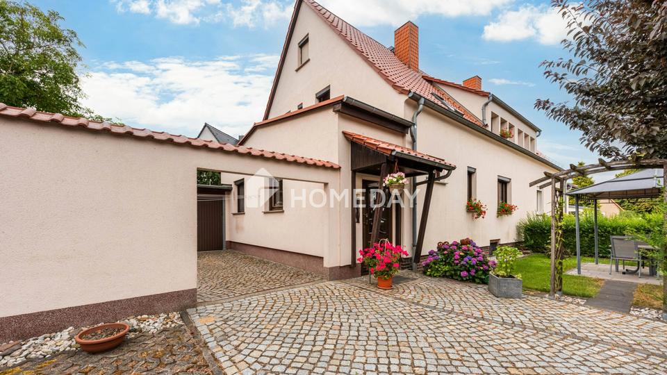 Idyllische Wohnqualität mit Garage, Garten, überdachter Südterrasse, Nebengebäude & Raumvielfalt