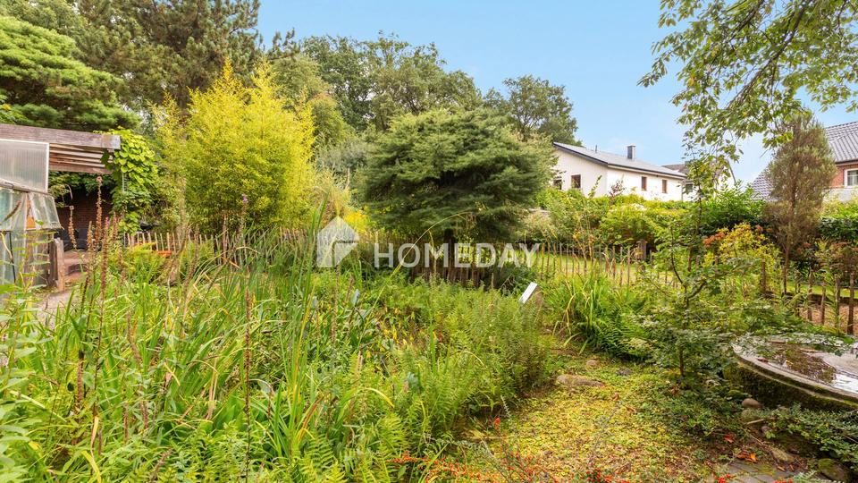 Stilvolles teilvermietetes Mehrfamilienhaus mit großem Grundstück und attraktiven Wohneinheiten – Bild 9