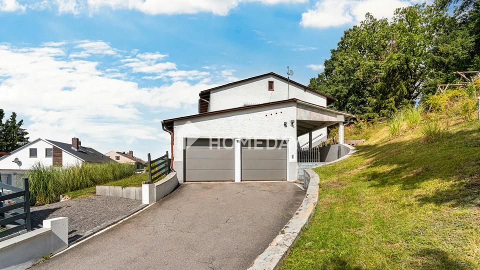 Familienidyll mit sechs Zimmern, moderner Küche und überdachter Terrasse – Bild 3