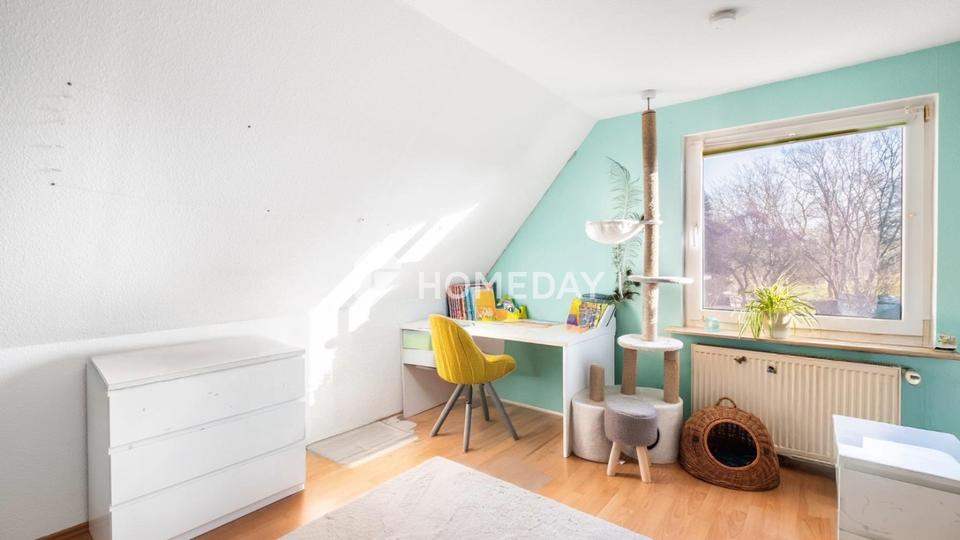 Am Feldrand und idyllisch gelegen: DHH mit Südterrasse, EBK + Carport | Gepflegt | Großes Grundstück – Bild 11