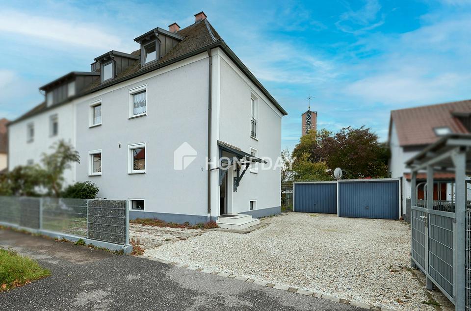 Gepflegte DHH mit vier Wohneinheiten, großem Garten und stabilem Mietertrag in zentraler Lage