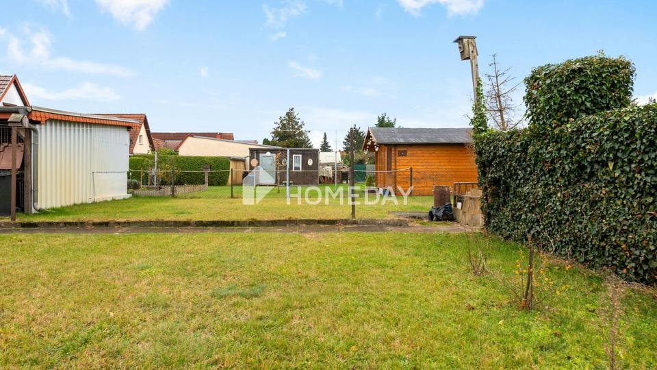 Viel Platz für Ihre Ideen: Einfamilienhaus mit 4 Zimmern, großem Garten und Nebengebäude – Bild 5