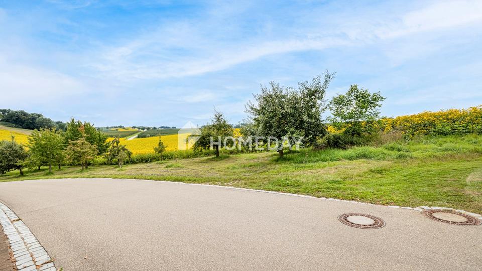 Modernes Einfamilienhaus mit Einliegerwohnung in Hanglage und tollem Ausblick – Bild 9