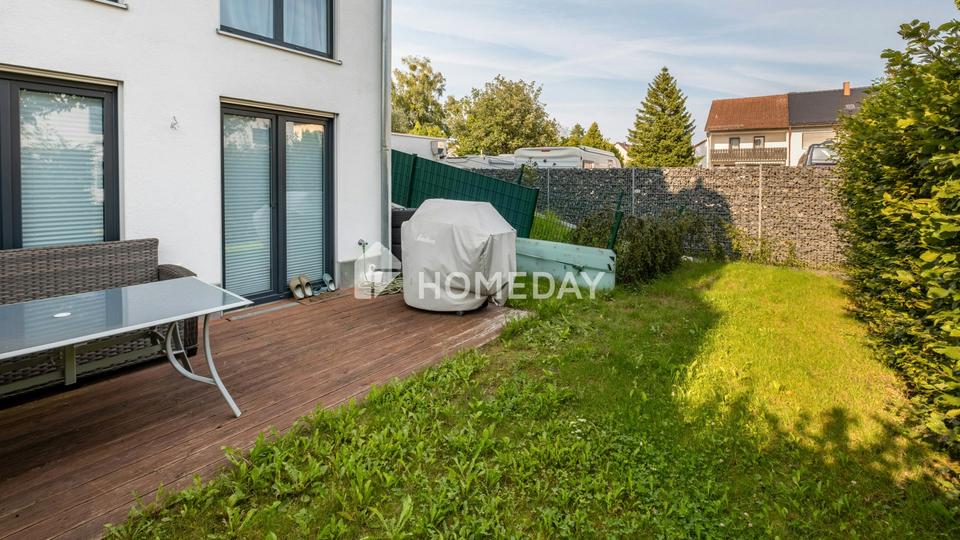 Moderne Maisonettewohnung mit Südterrasse und Garten – Bild 4