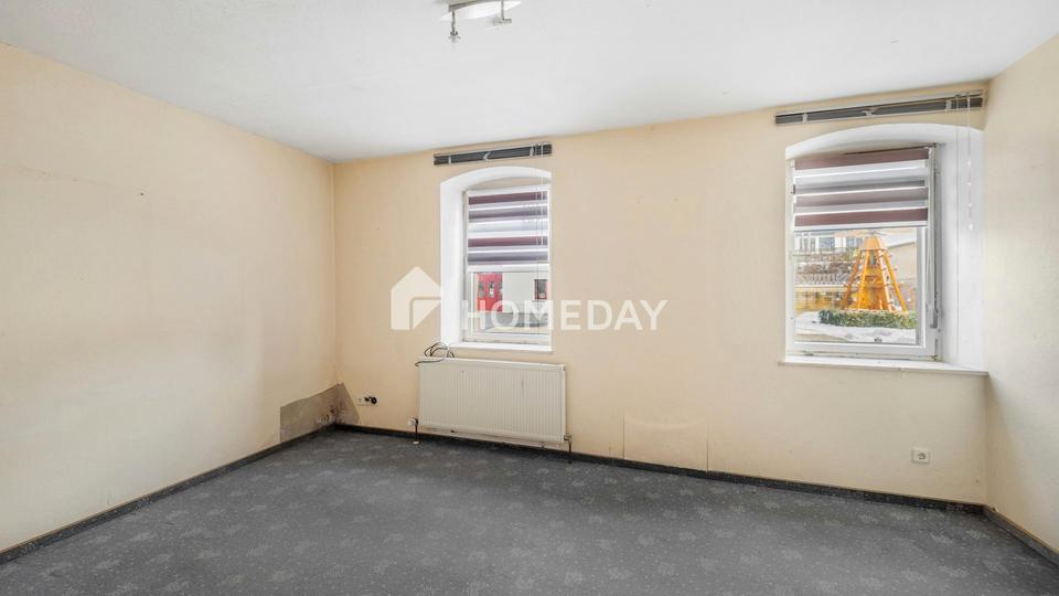 Familienfreundliches Einfamilienhaus mit 6 Zimmern, Garten, Balkon und Garagen – Bild 10