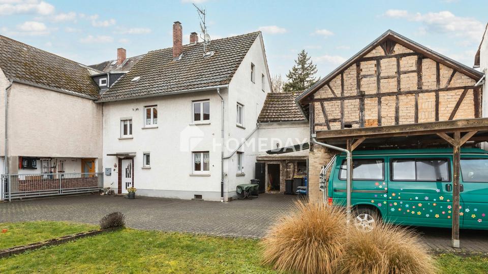 Charmantes EFH mit Ausbaupotenzial in zentraler Wohnlage – Bild 3