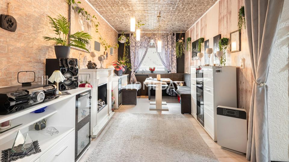 Zweifamilienhaus mit 210 m² Wohnfläche, Wintergärten, Loggia und gepflegtem Gartenparadies – Bild 10