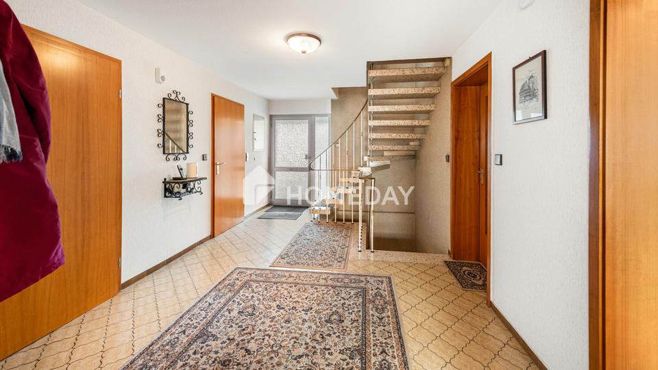 Familienfreundliches EFH mit sonnigem Wintergarten, Doppelgarage & großzügigem Grundstück – Bild 15