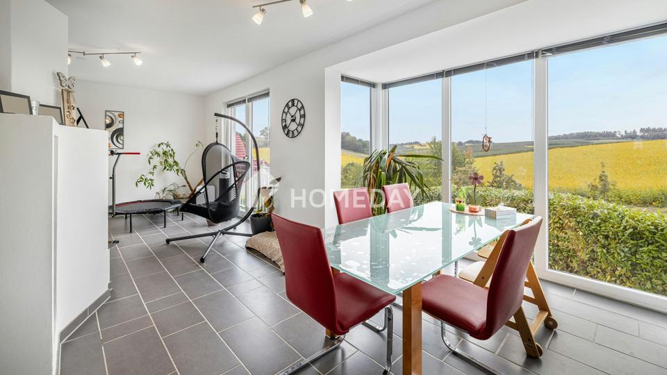 Modernes Einfamilienhaus mit Einliegerwohnung in Hanglage und tollem Ausblick – Bild 17