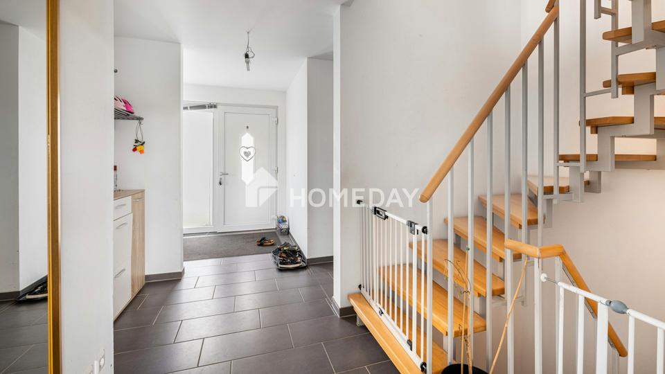 Modernes Einfamilienhaus mit Einliegerwohnung in Hanglage und tollem Ausblick – Bild 13