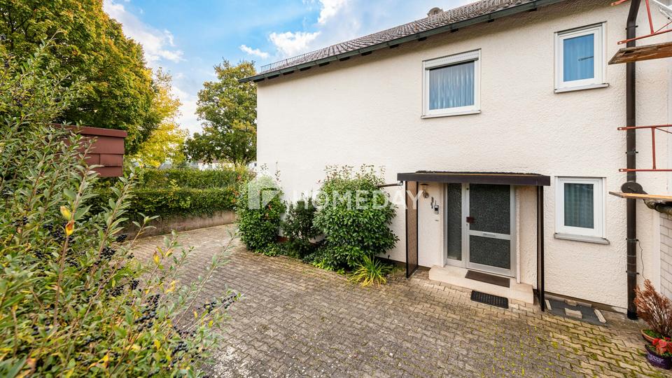 Familienfreundliches EFH mit sonnigem Wintergarten, Doppelgarage & großzügigem Grundstück – Bild 2