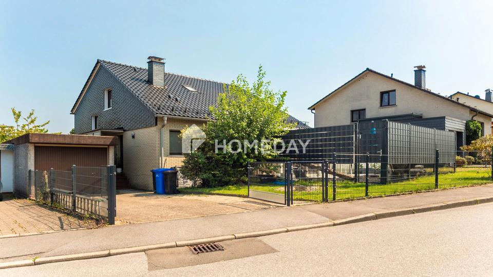 Modernisiertes Einfamilienhaus mit separater Einliegerwohnung und großem Grundstück – Bild 3