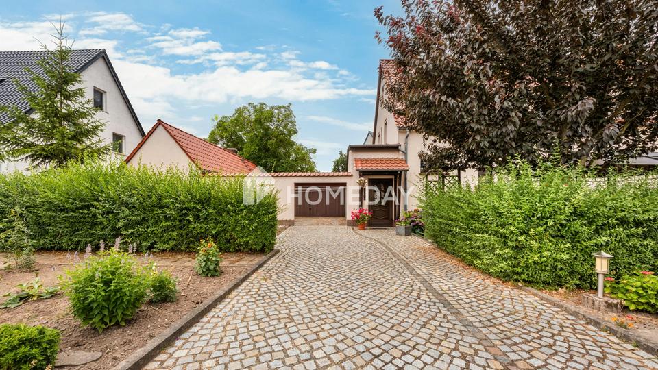 Idyllische Wohnqualität mit Garage, Garten, überdachter Südterrasse, Nebengebäude & Raumvielfalt – Bild 3