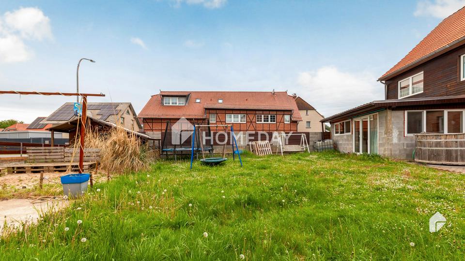Charmantes Mehrfamilienhaus mit zwei Wohneinheiten, Garage, Carport und großzügigem Garten – Bild 12