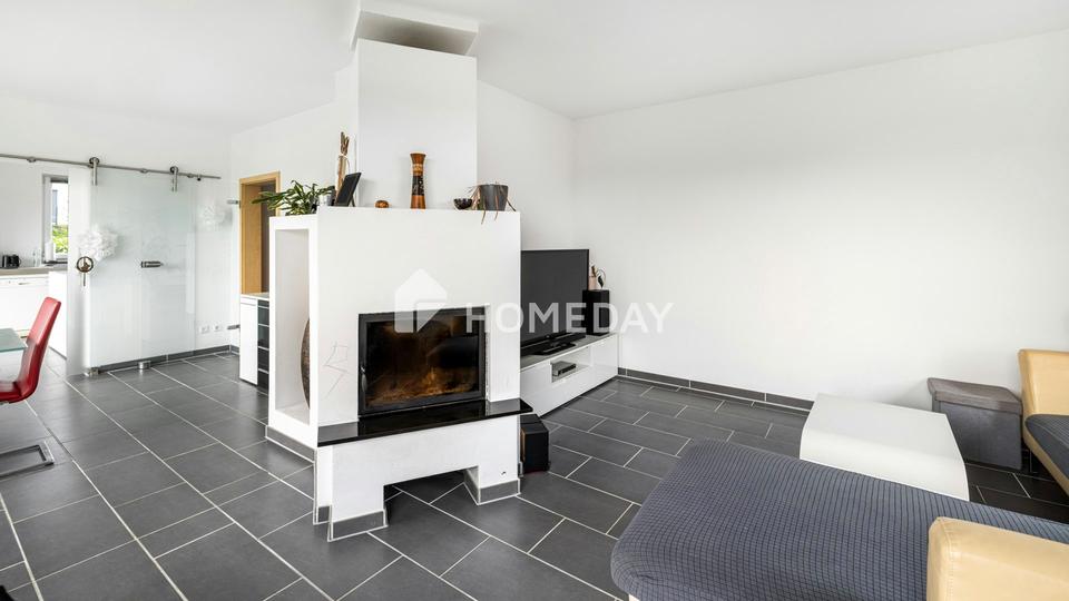 Modernes Einfamilienhaus mit Einliegerwohnung in Hanglage und tollem Ausblick – Bild 15