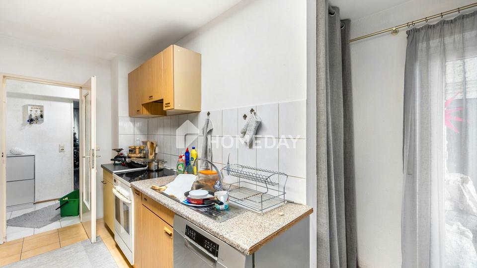 Vermietete 4-Zimmer-Erdgeschosswohnung mit zwei Balkonen und Stellplatz – Bild 5