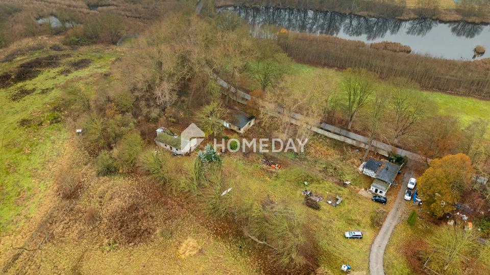 Großflächiges Grundstück mit Seezugang, Bestandsgebäuden und hohem Entwicklungspotenzial