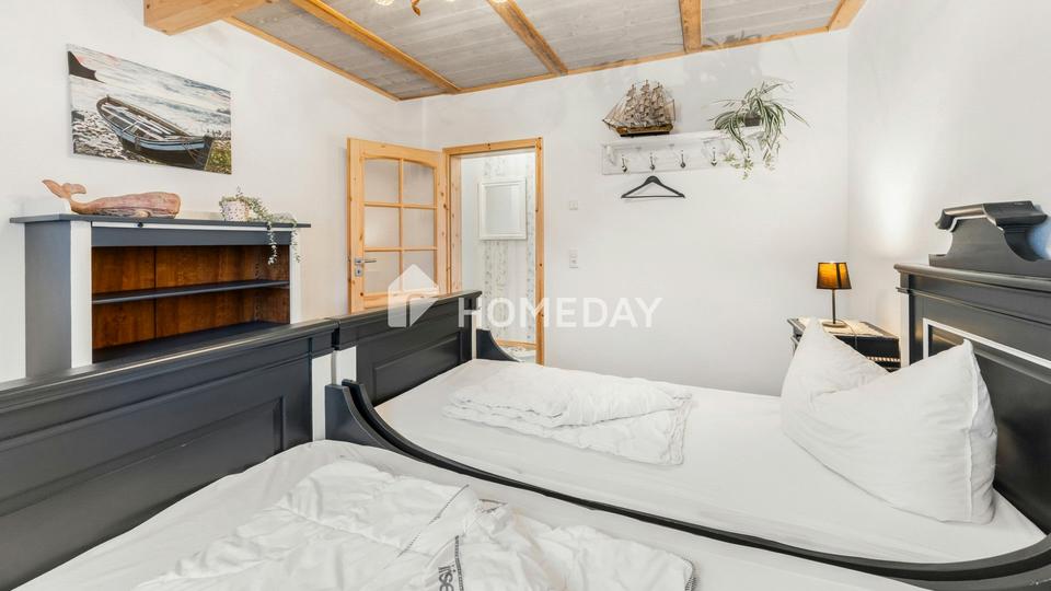 Wohnen auf zwei Ebenen – Einfamilienhaus mit Balkon, Terrasse und Garten – Bild 17