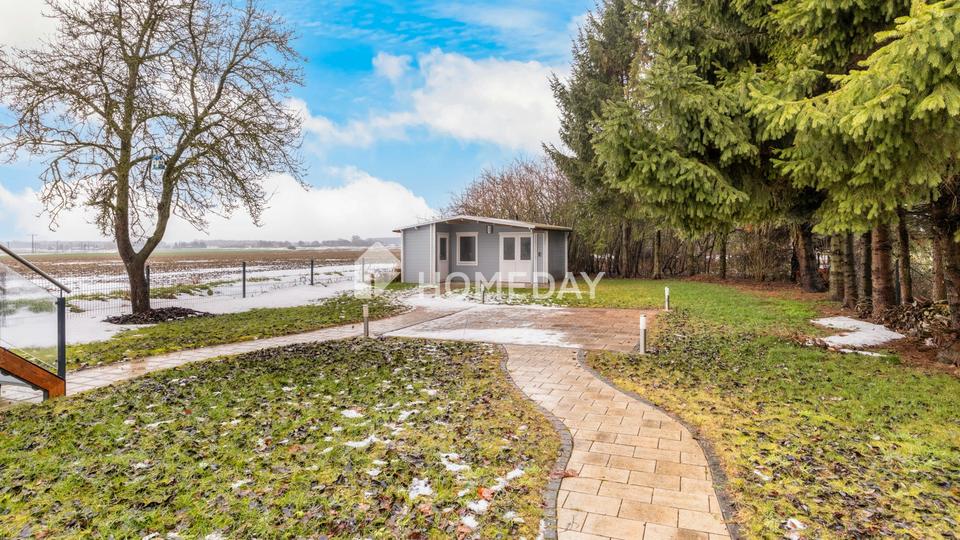 Wohnen auf zwei Ebenen – Einfamilienhaus mit Balkon, Terrasse und Garten – Bild 19