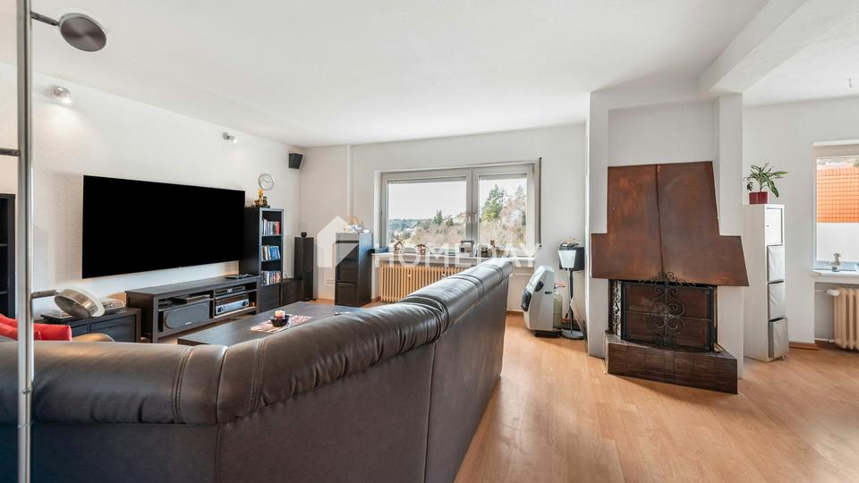 Zuhause ankommen: Großzügige Dachgeschosswohnung mit Kamin und Wohlfühlambiente – Bild 4