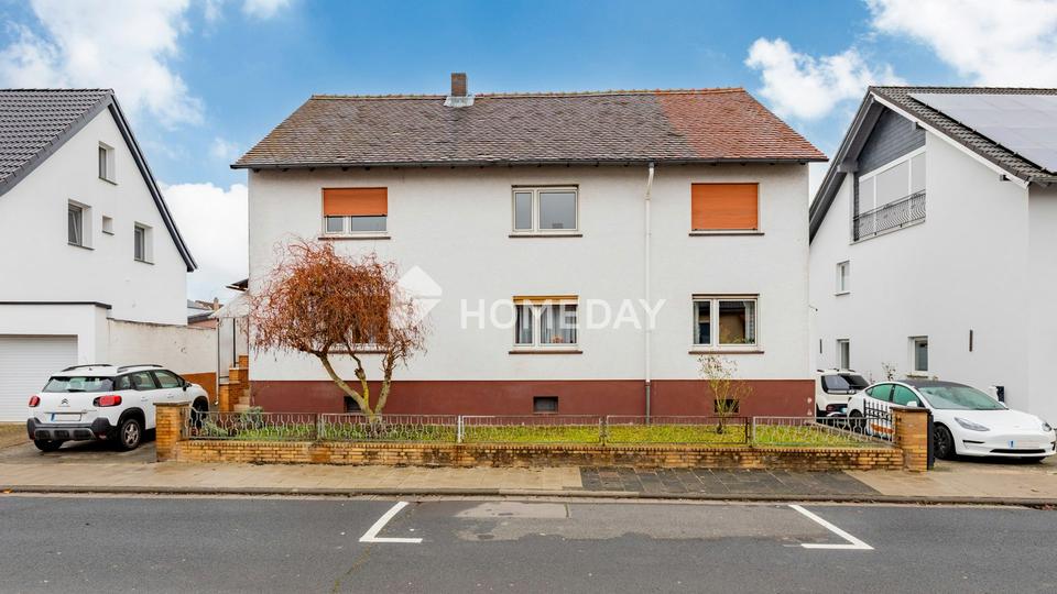 Ruhig gelegenes, vielseitig nutzbares Wohnhaus mit Garten, Pavillon und Stellplatz in Weckesheim – Bild 3