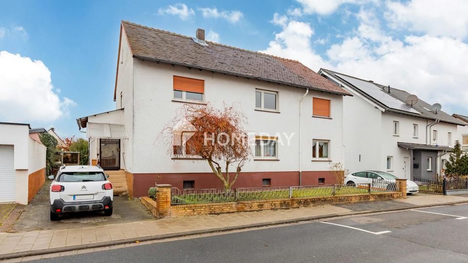 Ruhig gelegenes, vielseitig nutzbares Wohnhaus mit Garten, Pavillon und Stellplatz in Weckesheim