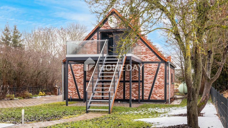 Wohnen auf zwei Ebenen – Einfamilienhaus mit Balkon, Terrasse und Garten – Bild 3