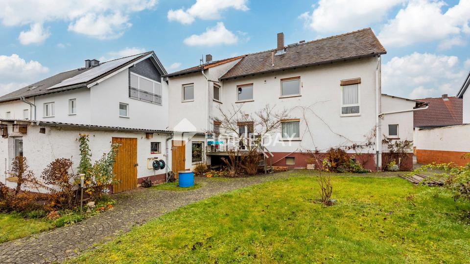 Ruhig gelegenes, vielseitig nutzbares Wohnhaus mit Garten, Pavillon und Stellplatz in Weckesheim – Bild 2