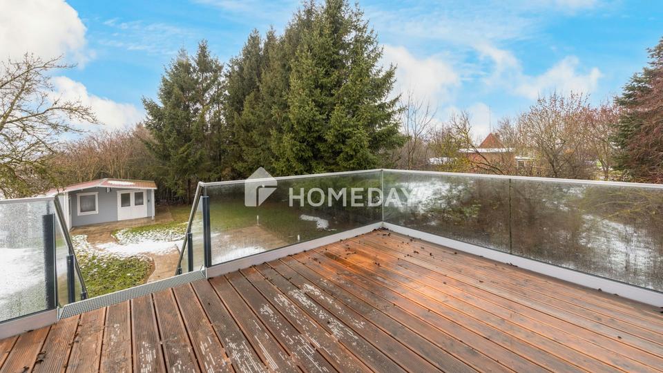 Wohnen auf zwei Ebenen – Einfamilienhaus mit Balkon, Terrasse und Garten – Bild 11