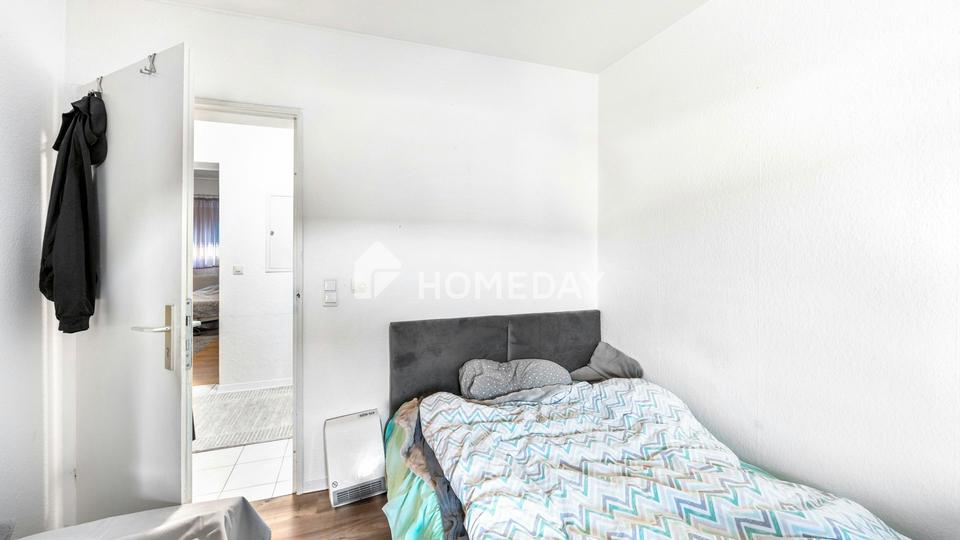 Vermietete 4-Zimmer-Erdgeschosswohnung mit zwei Balkonen und Stellplatz – Bild 12
