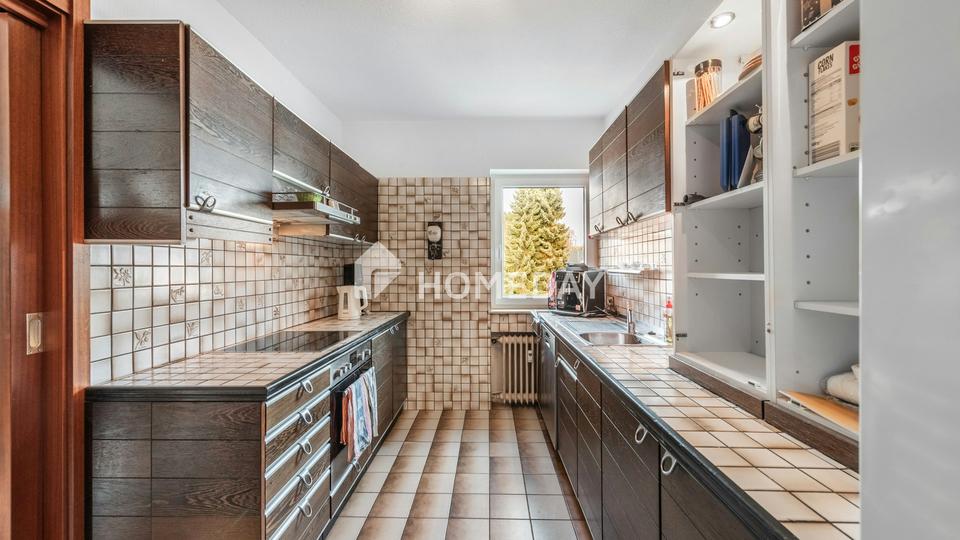 Zuhause ankommen: Großzügige Dachgeschosswohnung mit Kamin und Wohlfühlambiente – Bild 7