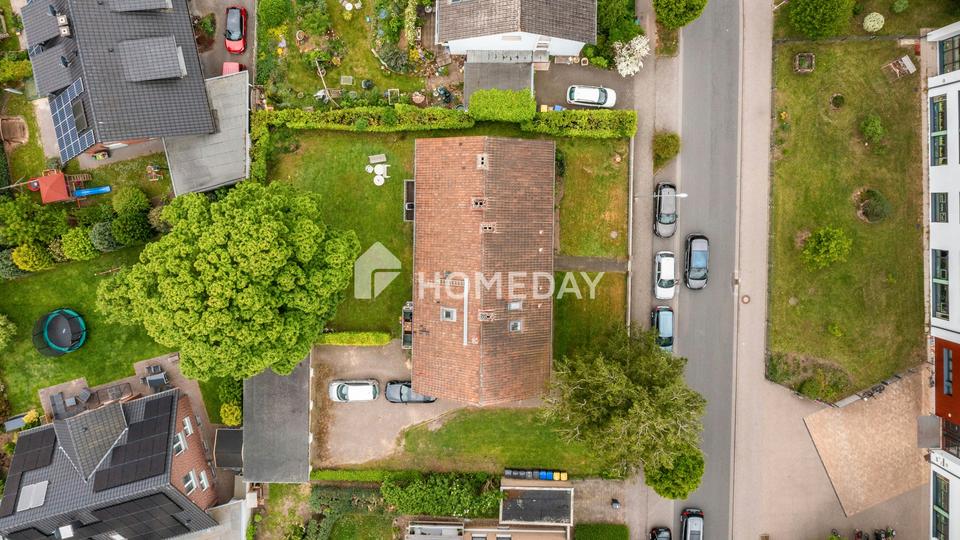 Charmante 3-Zimmer-Obergeschosswohnung mit Balkon, Gartenblick und Garage – Bild 10