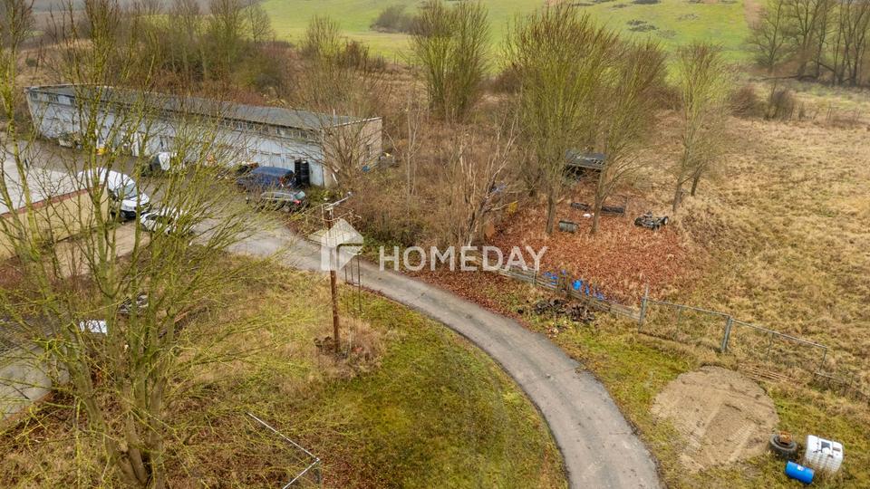 Großflächiges Grundstück mit Seezugang, Bestandsgebäuden und hohem Entwicklungspotenzial – Bild 2