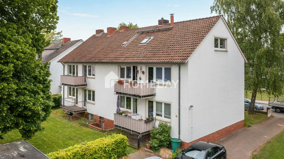 Charmante 3-Zimmer-Obergeschosswohnung mit Balkon, Gartenblick und Garage – Bild 7