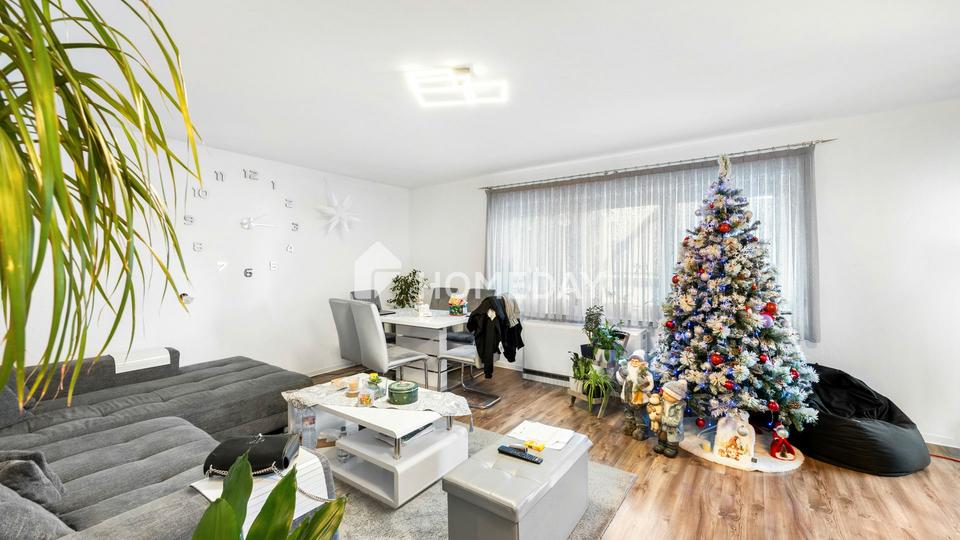 Vermietete 4-Zimmer-Erdgeschosswohnung mit zwei Balkonen und Stellplatz – Bild 2