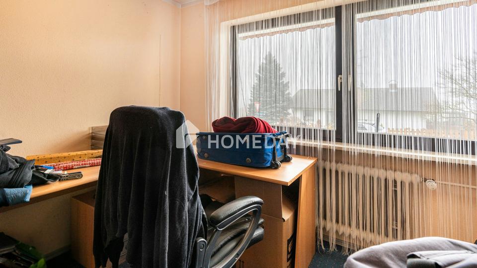 Großzügiges Zweifamilienhaus mit Kamin, Garten und Ausbaureserve – Bild 16