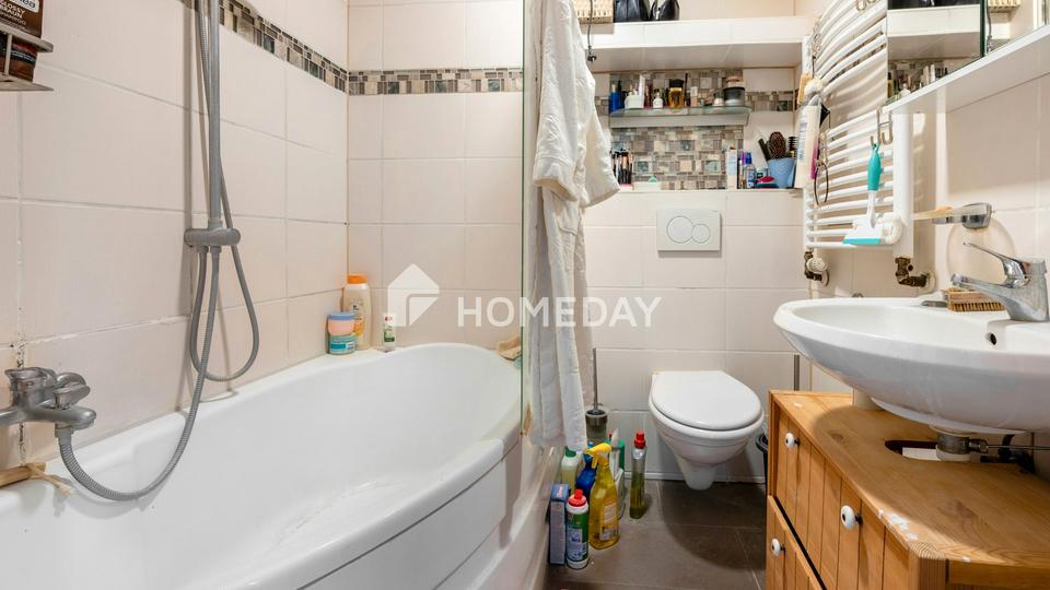 Familienfreundliche Maisonette-Wohnung mit Garten und Stellplatz in zentraler Lage – Bild 8