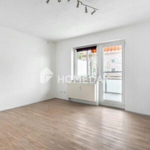 Helle Drei-Zimmer-Wohnung mit durchdachtem Grundriss und Balkon in gepflegtem Mehrfamilienhaus