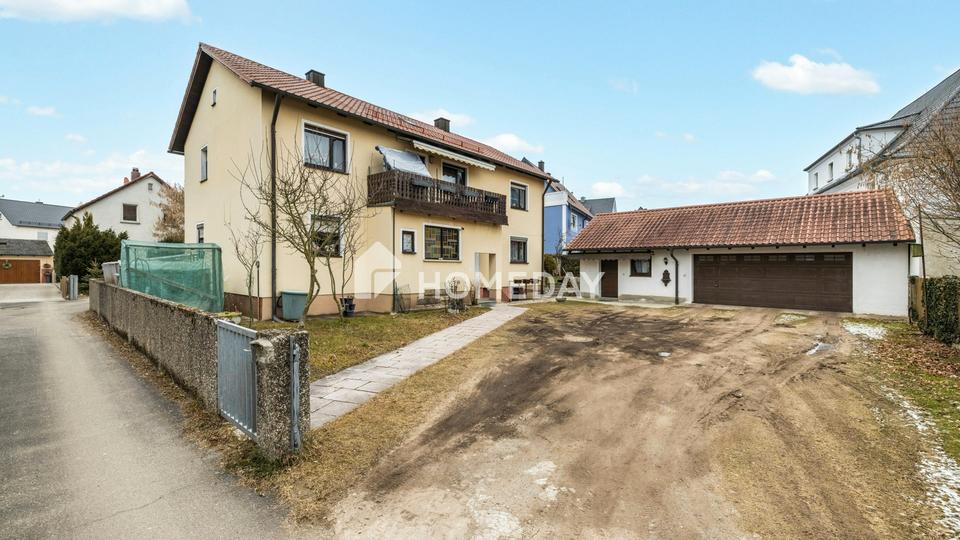 Großzügig & vielseitig: Zweifamilienhaus mit Garten, 2 Garagen und Balkonen in Krondorf – Bild 22