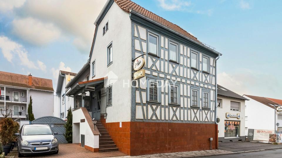 Gepflegtes Mehrfamilienhaus mit vier Wohnungen, Restaurant, Terrasse und Hof in Sulzbach am Main – Bild 3